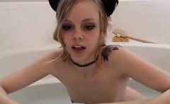 Young Kitten Taking A Bath In The Tub