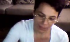 Naughty Grandma Strips And Rubs Her Pussy