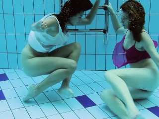Hotly dressed teens in the pool