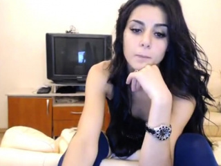 Solo brunette with hairy pussy on webcam