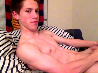 Two twinks talk dirty and jerk off in tandem