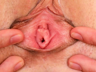 Petite virgin stretching pussy in close-up