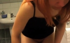 redhead stepmom spied on in the bathroom