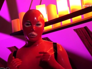 Shemale in Red Latex is Ready to Dominate You