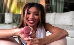 Cheerleader Asian babe jerks POV cock