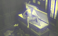 Couple Fucking in Coffin