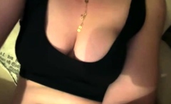 Swiss bottomless girl plays with creamy pussy