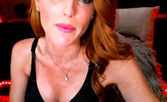 Amateur redhead poses and masturbates with toys