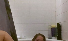 Busty curly brunette with big boobs fucks on couch