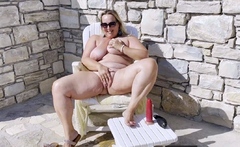Big-Titted Milf Squirts Outdoors with Sex Toy